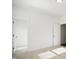 Well-lit bedroom with window, closet, and doors to other rooms at 2029 Maggie Valley Dr, Apex, NC 27502