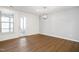 Spacious dining room with hardwood floors and access to porch at 2029 Maggie Valley Dr, Apex, NC 27502