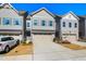 Modern 3-unit townhome development with 2-car garages at 2029 Maggie Valley Dr, Apex, NC 27502