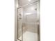 Clean shower with tiled walls and built-in seat at 2029 Maggie Valley Dr, Apex, NC 27502