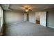 Bright bedroom with ensuite bathroom access and ceiling fan at 228 Mahogany Way, Four Oaks, NC 27524