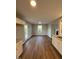Bright dining area with hardwood flooring and access to a deck at 228 Mahogany Way, Four Oaks, NC 27524