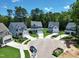 A picturesque shot of homes in a circular cul-de-sac surrounded by mature trees in a planned community at 2628 Silver Gate Ct, Wake Forest, NC 27587