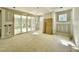Living room with sliding glass doors to the backyard at 2628 Silver Gate Ct, Wake Forest, NC 27587