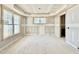 Living room featuring large windows and natural lighting at 2628 Silver Gate Ct, Wake Forest, NC 27587