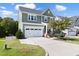 Two-story craftsman home with driveway and attached garage at 296 Two Creeks Lp, Chapel Hill, NC 27517
