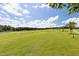 Beautiful Golf Course with sand traps, a manicured fairway, and large established trees at 296 Two Creeks Lp, Chapel Hill, NC 27517