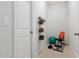 Hallway with workout gear neatly arranged, offering a practical space for fitness activities at home at 296 Two Creeks Lp, Chapel Hill, NC 27517