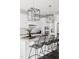 Kitchen island with granite countertops, pendant lighting, and stainless appliances at 296 Two Creeks Lp, Chapel Hill, NC 27517