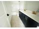 New bathroom featuring double sink vanity, quartz countertop, and shower-tub combo at 4327 Emeline Way # 10, Fuquay Varina, NC 27526