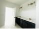 New bathroom featuring double sink vanity with a contrasting cabinet, hardware, and fixtures at 4327 Emeline Way # 10, Fuquay Varina, NC 27526