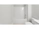 Bright white bathroom featuring a shower and neutral color palette at 545 Eversden Dr, Zebulon, NC 27597
