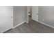 Spacious bedroom with hardwood floors and access to hallway at 708 N Allen Rd, Wake Forest, NC 27587