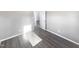 Hardwood floor bedroom with door to hallway at 708 N Allen Rd, Wake Forest, NC 27587