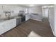Updated kitchen with stainless steel appliances and white cabinets at 708 N Allen Rd, Wake Forest, NC 27587