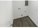 Laundry room with vinyl flooring and hookups for washer and dryer at 708 N Allen Rd, Wake Forest, NC 27587
