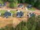 Birds eye view of new construction neighborhood showing houses in a wooded area at 95 Purslane Dr, Franklinton, NC 27525