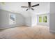 Bedroom with two windows and ceiling fan, bringing in tons of natural light at 95 Purslane Dr, Franklinton, NC 27525