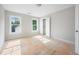 Bedroom with a closet and two large windows bringing in natural light at 95 Purslane Dr, Franklinton, NC 27525