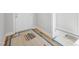 The Entryway features wood-look flooring with a white door and white trim at 95 Purslane Dr, Franklinton, NC 27525
