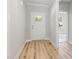 Welcoming foyer with light hardwood flooring and a classic front door at 95 Purslane Dr, Franklinton, NC 27525