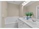 Bathroom boasts double sinks and a relaxing bathtub at 201 Presque Isle Ln, Chapel Hill, NC 27514