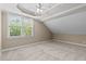 Bright bedroom with vaulted ceiling and carpeting at 201 Presque Isle Ln, Chapel Hill, NC 27514