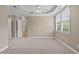 Spacious bedroom with neutral walls and carpet at 201 Presque Isle Ln, Chapel Hill, NC 27514