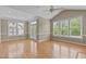 Bright dining area with hardwood floors and access to a deck at 201 Presque Isle Ln, Chapel Hill, NC 27514