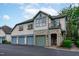 Three-car garage, stone accents, and a charming front entrance at 201 Presque Isle Ln, Chapel Hill, NC 27514