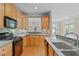 Spacious kitchen with an island and ample counter space at 201 Presque Isle Ln, Chapel Hill, NC 27514
