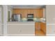 Modern kitchen with stainless steel appliances and wood cabinets at 201 Presque Isle Ln, Chapel Hill, NC 27514