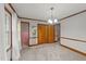 Bright bedroom with neutral carpet, updated paint, wood trim, two windows with bright light and closet space at 205 N Augusta Ave, Benson, NC 27504