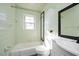 Clean bathroom with a bathtub, toilet, and vanity at 2540 Mayo Lake Rd, Roxboro, NC 27574