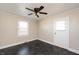 Cozy bedroom with dark tile floors and exterior access at 2540 Mayo Lake Rd, Roxboro, NC 27574