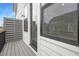 Private balcony with wood railing and view of nearby homes at 316 Church St, Morrisville, NC 27560