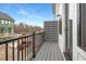 Relax on this outdoor balcony with modern railing and privacy screen for comfortable outdoor living at 316 Church St, Morrisville, NC 27560