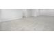 Spacious living room with carpet flooring and multiple doorways at 316 Church St, Morrisville, NC 27560