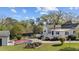 Backyard showing the house, basketball court, and deck at 400 S Boddie St, Nashville, NC 27856