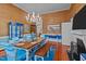 Inviting dining room with decorative lighting, bright walls, and blue accents at 400 S Boddie St, Nashville, NC 27856