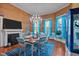 Inviting dining room with decorative lighting, bright walls, and blue accents at 400 S Boddie St, Nashville, NC 27856