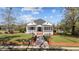 Charming home with inviting front porch, lush lawn, and classic architectural details at 400 S Boddie St, Nashville, NC 27856