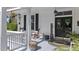 Relaxing front porch with comfortable seating, charming decor, and a welcoming atmosphere at 400 S Boddie St, Nashville, NC 27856