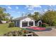 Exterior view of a spacious garage and backyard basketball court at 400 S Boddie St, Nashville, NC 27856