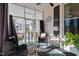 Screened-in porch with wicker furniture, outdoor rug, and view of the surrounding yard at 400 S Boddie St, Nashville, NC 27856