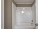 Clean bathroom with a shower/tub combo at 408 W Main St, Pine Level, NC 27568