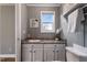 Small half bathroom with vanity and toilet at 408 W Main St, Pine Level, NC 27568