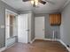 Laundry Room with wood cabinets and vinyl flooring at 408 W Main St, Pine Level, NC 27568