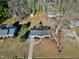 Ranch house aerial view showing driveway and yard at 5317 Ten Ten Rd, Apex, NC 27539