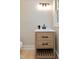 Updated bathroom with vanity and window at 5317 Ten Ten Rd, Apex, NC 27539